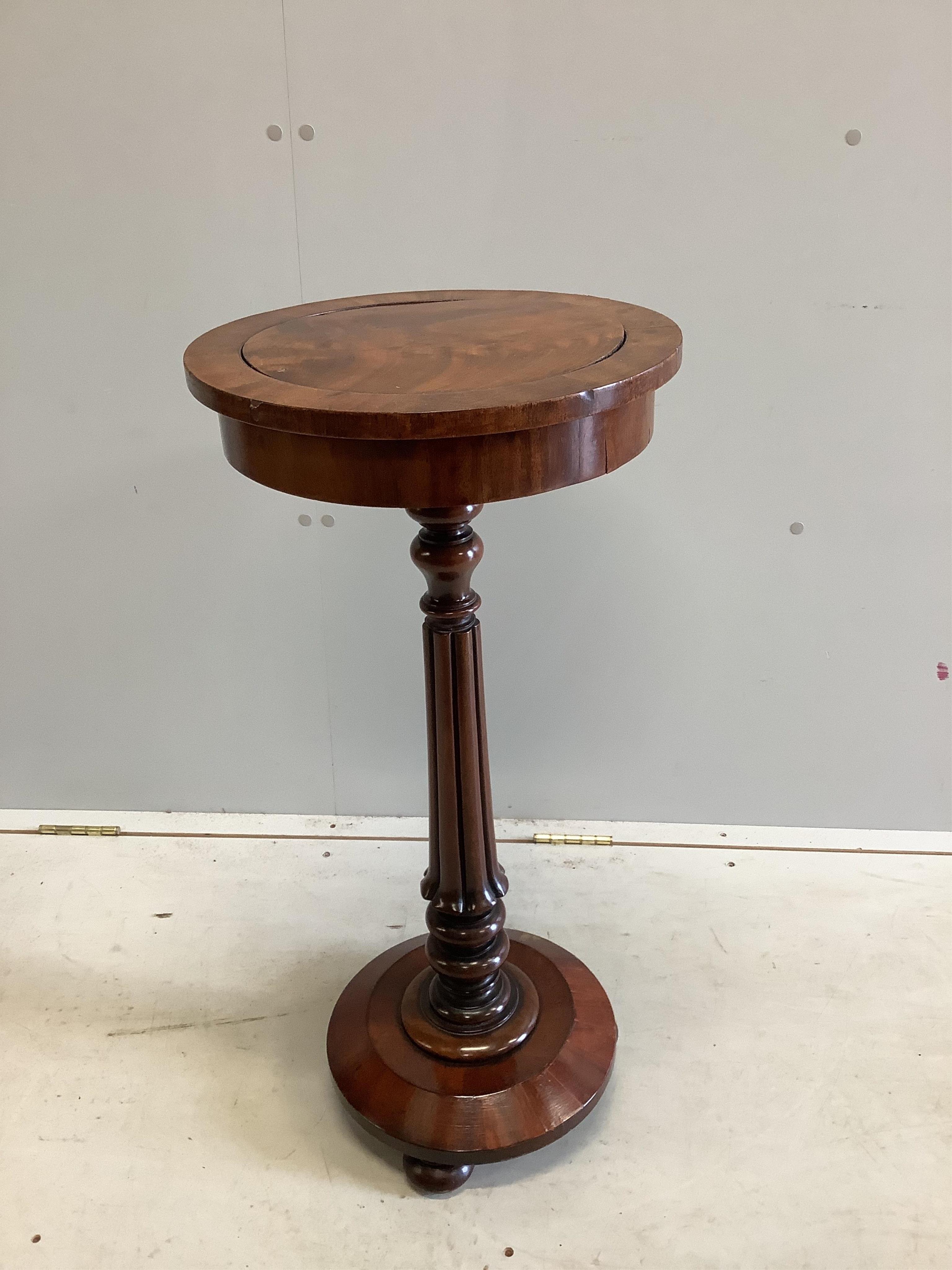 A William IV circular mahogany wine table, diameter 37cm, height 78cm. Condition - fair